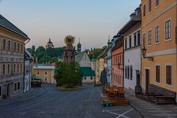 Naklejka premium Sunrise view of the holy trinity square in Banska Stiavnica, Slo