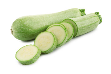 Fresh whole and cut zucchinis isolated on white