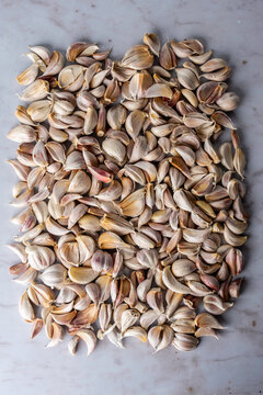 Closeup of cloves of garlic with the skin still on 
