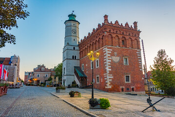 Obraz premium Sunset view of town hall at Rynek square in Sandomierz, Poland