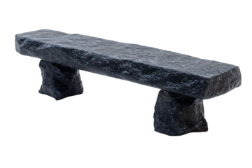 A sculpted stone bench against a black background.