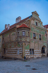 Fototapeta premium Sunrise view of colourful houses at historical square in Telc, C