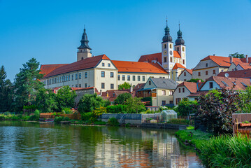 Naklejka premium Reflection of Telc castle in Czech republic