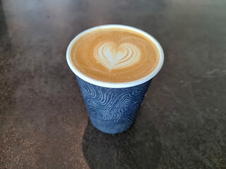 A cup of hot latte coffee.