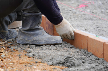 Brick Exterior Construction Work（レンガを使った外構工事の作業風景）