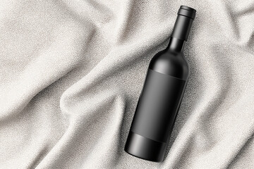 Fototapeta premium Black bottle on a textured silver fabric. Ideal for cosmetics, beauty products, luxury items, or design elements in elegant compositions.