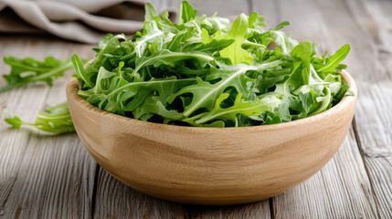 Fresh arugula and lettuce in wooden bowl, vibrant greens create healthy meal option