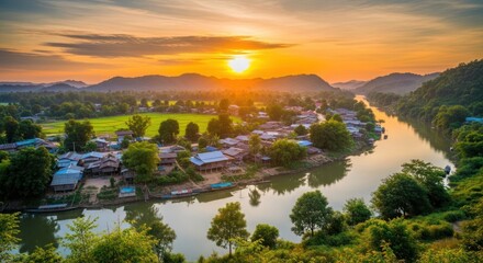 Fototapeta premium Sunrise over a river village
