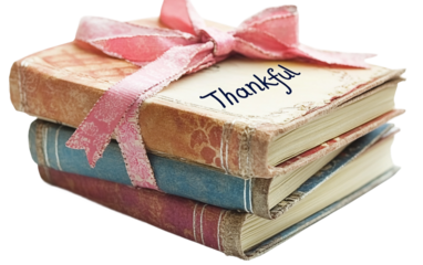 Stack of Thankful journals tied with ribbon symbolizing gratitude and cherished memories isolated on transparent background PNG