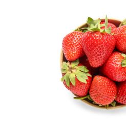 Bowl of fresh strawberries on white background