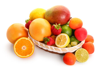 Wicker bowl with different fresh fruits on white background