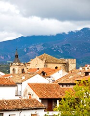 Obraz premium European town nestled in mountains