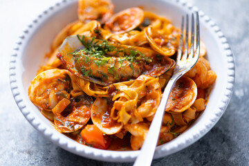 italian seafood pasta in tomato sauce
