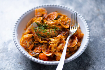 italian seafood pasta in tomato sauce