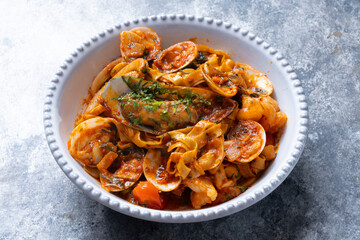italian seafood pasta in tomato sauce