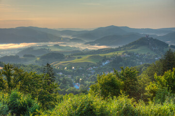 Naklejka premium Sunrise view of the calvary overlooking Banska Stiavnica in Slov