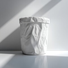 Crumpled White Paper Waste Bin in Modern Minimalist Interior with Natural Light and Shadow Play