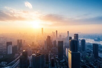 Fototapeta premium Aerial view of a sprawling city at sunset