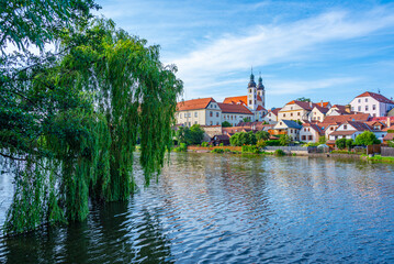 Fototapeta premium Reflection of Telc castle in Czech republic