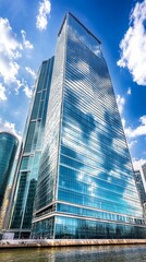 Fototapeta premium Modern skyscraper reflecting clouds