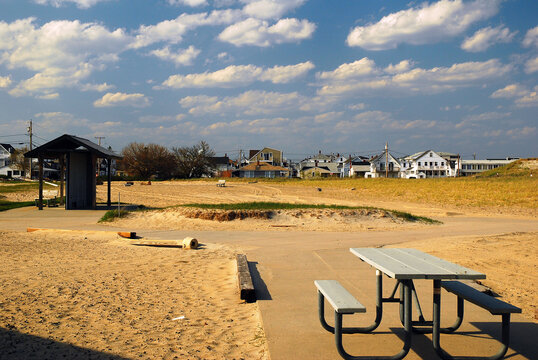 A picnic and rest area in a park appears deserted during the off season and cold weather months
