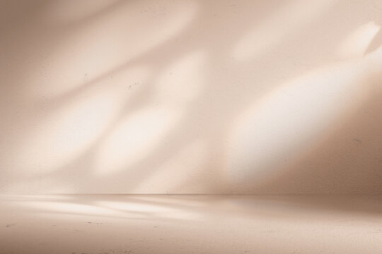 Minimal beige wall room background with soft natural light and shadow overlay. Perfect for product display and modern design template