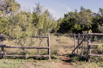 Old Wooden Gate To Tree Lined Field