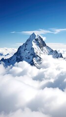 Majestic mountain peak above clouds