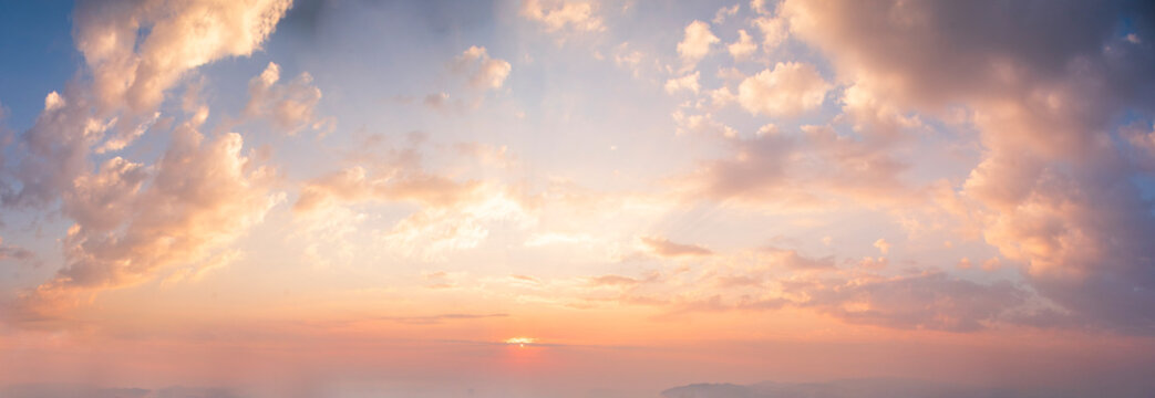 Banner Golden sky sunrise dramatic beautiful landscape view. Dawn sky gold dusk time cloudscape with sunlight. Panorama Dramatic sunset scenic landscape. Beautiful landscape nature with copy space