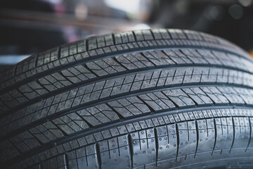 New tire is placed on the tire storage rack in the tire industrial. Be prepared for vehicles that need to change tires.