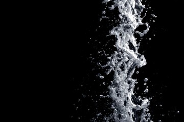 Stunning Water Splash with Dramatic Black Background for Creative Visual Projects and Designs