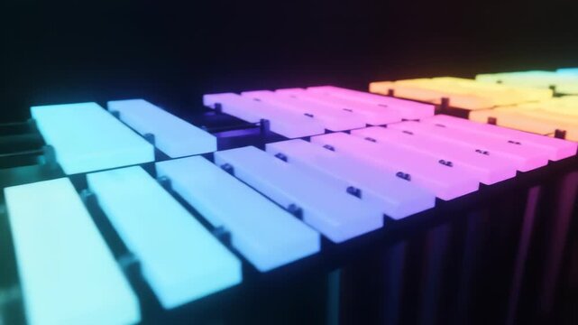 A macro close-up showcases a vibrant xylophone with rainbow hues against a black backdrop, casting dynamic reflections and creating a lively, musical atmosphere.