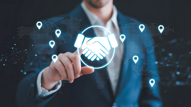 Businessman touching holographic handshake icon surrounded by location pins and digital data overlay