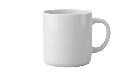 A simple white ceramic mug with a rounded handle isolated against a black background in a studio shot