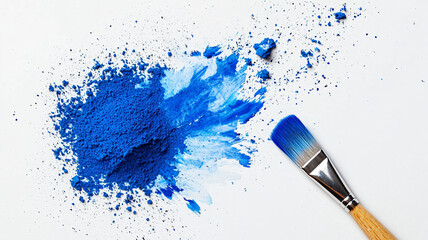 Vibrant Blue Powder with Brush on White Background for Creative Art