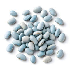 Close-up of dried navy beans scattered on a white background, showing their small oval