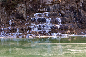 Frozen rocks in the cold winter