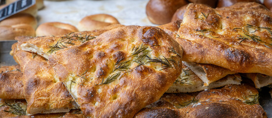 A close-up image of delicious freshly baked rosemary focaccia.