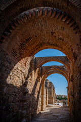 Fototapeta premium Excavations of the roman Casa del Mitreo in Merida, Spain,Stone columns of a Roman construction in Merida, Badajoz, Spain
