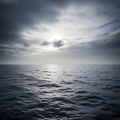 Obraz premium Vast, Gray Ocean Horizon Under Cloudy Sky.