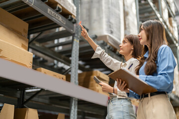 Female engineers team discussing inventory in warehouse logistics and supply chain planning, operation management, data analysis, warehouse shipping, inventory tracking, optimization and technology