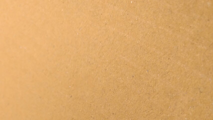 Background of brown kraft paper or cardboard texture. Brown recycled paper texture background.