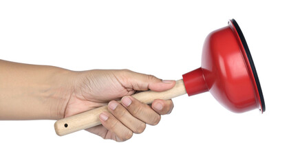 A person's hand holding a red plunger with a wooden handle, commonly used for unclogging drains.
