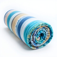 Rolled up  beach towel on white background