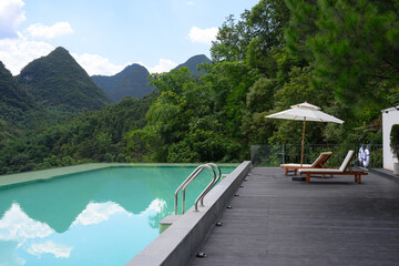 The swimming pool halfway up the mountain