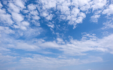 clear blue sky background,clouds with background, Blue sky background with tiny clouds. White fluffy clouds in the blue sky. 