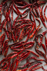 Roasted dried chilies placed on a baking tray, Roasted dried chilies background.