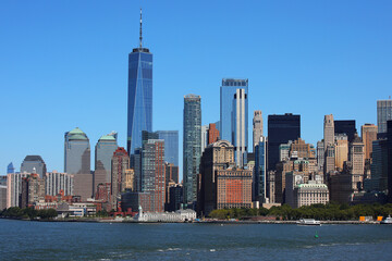 breathtaking view from the river of the manhattan skyline with freedom tower also called One World Trade Center