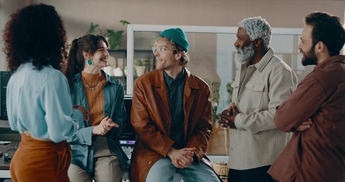 Programmer, team and meeting with business people in office for coding project, app idea and talking. Speaker, collaboration and software engineer with employees in tech startup for planning - Powered by Adobe