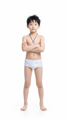 Obraz premium Confident little boy standing shirtless in yellow briefs, arms crossed, on a white background. Perfect for health, wellness, and children's themes.